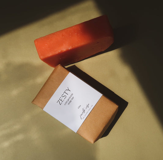 Cleanse and Revive with our cold process soap bars.   Our unique bars are designed to gently cleanse & moisturize.  The sweet scent of oranges & patchouli, revive for early morning showers. #soapbars #spasoaps #bathsoap #selfcaresoap #bathingsoap #bathroomsoap #giftideasforher #selfcareproducts #holidaygiftforher #holidaygiftforhim #holidaygiftforthem #selfcaregifts