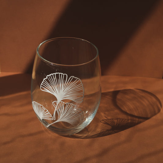 Clear Stemless Wine Glass, Gingko Stem. Holiday gift idea for any wine lover. Cheers! #wineglasses #winedrinker #designerwineglasses #cocktaildrink #drinkware #tablesetting #drinks #cocktailglasses #redwine #whitewine #stemlesswineglasses