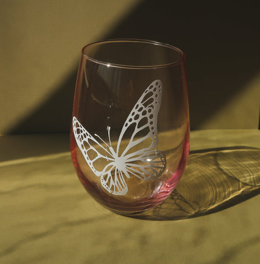 Pink Stemless Wine Glass, Butterfly. Holiday gift idea for any wine lover. Cheers! #wineglasses #winedrinker #designerwineglasses #cocktaildrink #drinkware #tablesetting #drinks #cocktailglasses #redwine #whitewine #stemlesswineglasses #girlsnight #bachelorettepartyfavors #bacheloretteparty
