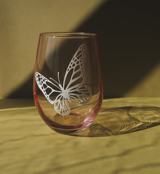 Pink Stemless Wine Glass, Butterfly. Holiday gift idea for any wine lover. Cheers! #wineglasses #winedrinker #designerwineglasses #cocktaildrink #drinkware #tablesetting #drinks #cocktailglasses #redwine #whitewine #stemlesswineglasses #girlsnight #bachelorettepartyfavors #bacheloretteparty